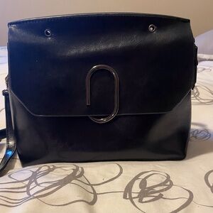 Black Leather Crossbody Bag by Maison Beaute.